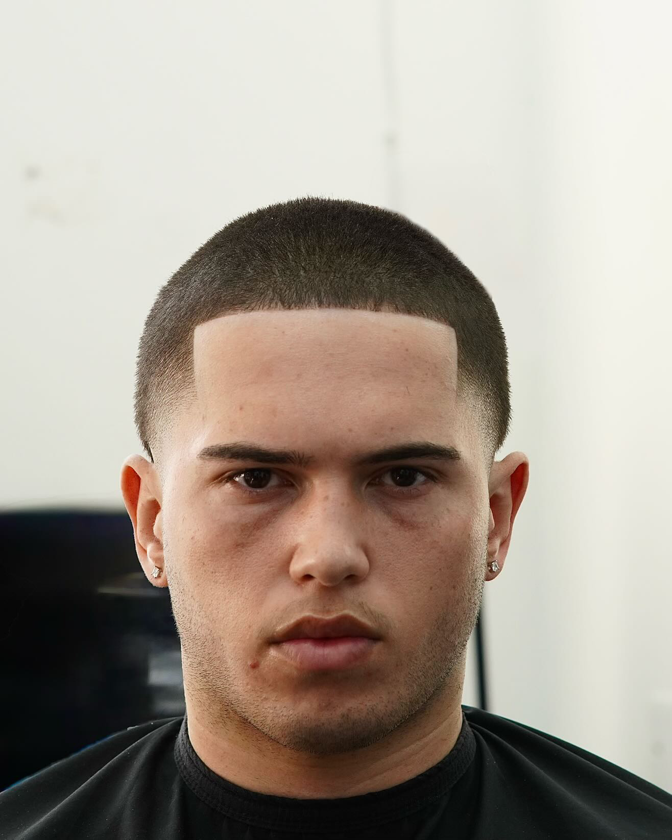 Buzz cut with squared line up at PB Barbers