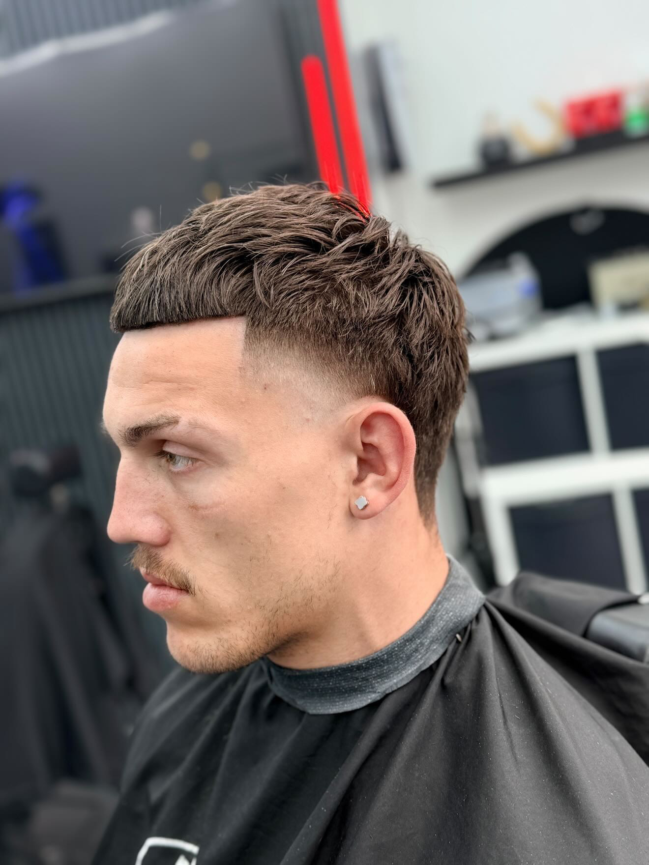 French crop with mid fade at PB Barbers